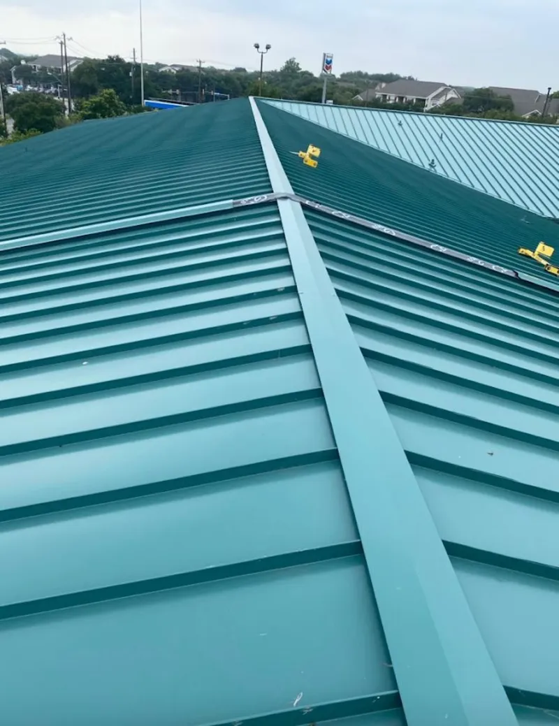 Green commercial metal roof ridge and valley for Metal Roof Repair in Reynolds