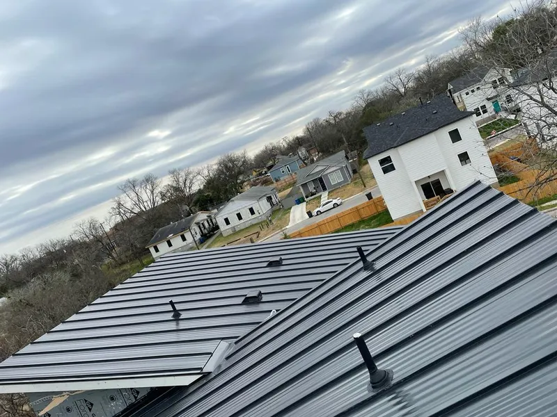 Standing seam metal roof panels with vents for Skylight Repair in Reynolds